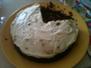 Fudgy almond cake with mint syrup and frosting